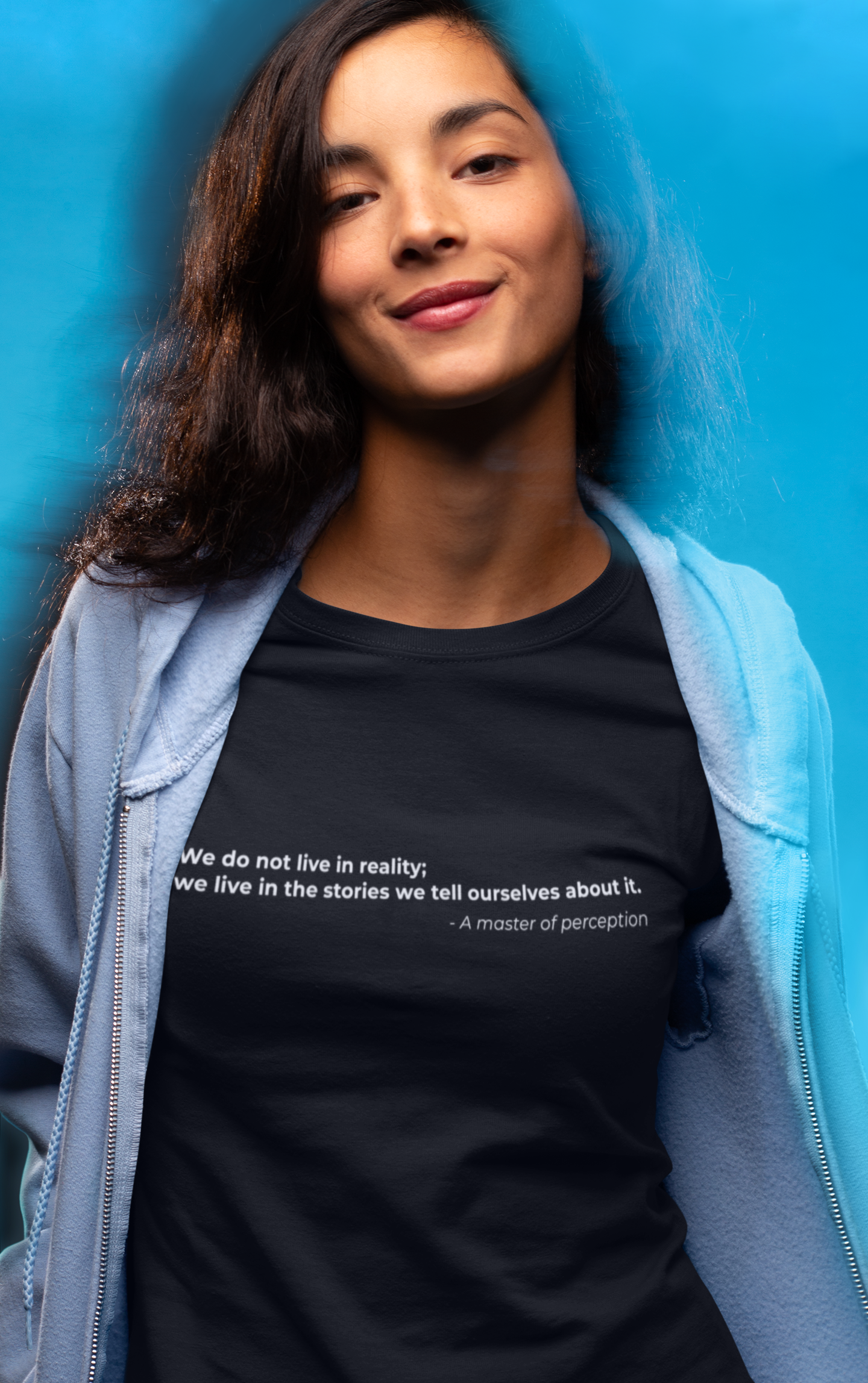 We do not live in reality we live in the stories we tell ourselves about it - Women's Tee